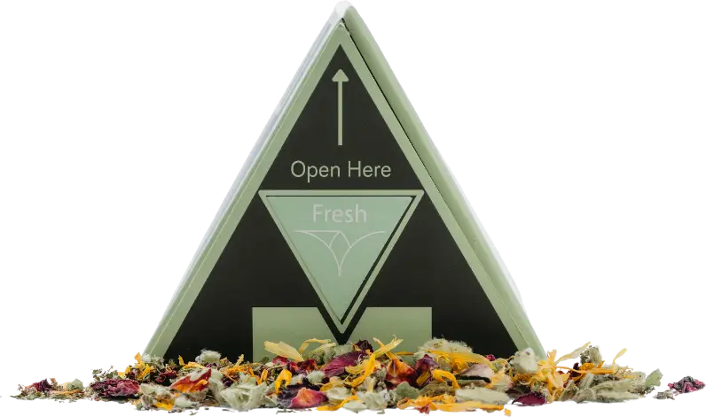 Fresh Blend herbal smoking mix in a triangle box with loose dried botanicals including rose petals, calendula and herbs spilling out in front
